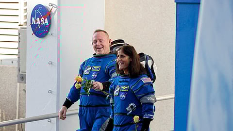 FILE PHOTO: NASA astronauts Butch Wilmore and Suni Williams walk at NASA's Kennedy Space Center, ahead of Boeing's Starliner-1 Crew Flight Test (CFT) mission on a United Launch Alliance Atlas V rocket to the International Space Station, in Cape Canaveral, Florida, U.S., June 5, 2024. 