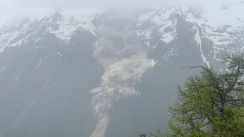 Mud and rocks slide down a mountain after a glacier partially collapsed covering most of the village of Blatten, Switzerland May 28, 2025, in this screen grab taken from a handout video. 