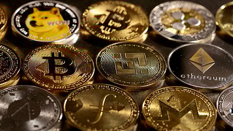 FILE PHOTO: Representations of cryptocurrencies are seen in this illustration, August 10, 2022. 