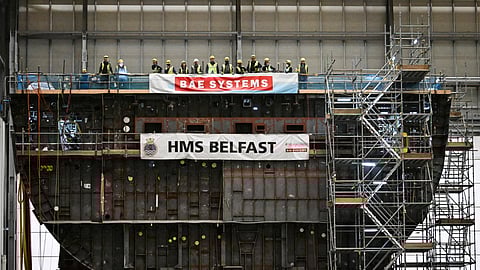 Members of staff react during a visit by Britain's Prime Minister Keir Starmer to the BAE Systems' Govan facility, in Glasgow, Scotland, Britain, June 2, 2025. 