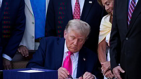 U.S. President Donald Trump signs the sweeping spending and tax legislation, known as the "One Big Beautiful Bill Act," at the White House in Washington, D.C., U.S., July 4, 2025. 