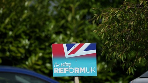 FILE PHOTO: A Reform UK party poster is seen outside a house ahead of the forthcoming Runcorn and Helsby parliamentary by-election in Frodsham, Britain, April 25, 2025.