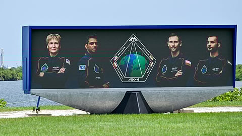 FILE PHOTO: Axiom-4 astronauts, commander Peggy Whitson of U.S., pilot Shubhanshu Shukla of India, mission specialist Slawosz Uznanski-Wisniewski of Poland and mission specialist Tibor Kapu of Hungary, are pictured on the countdown video clock, as the SpaceX Falcon 9 rocket stands at Launch Complex 39-A after a delay of its mission to the International Space Station, in Cape Canaveral, Florida, U.S., June 9, 2025. 