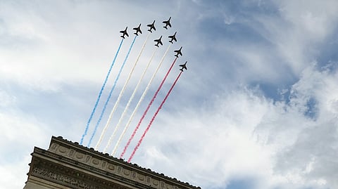 Alpha Jets of the French Air Force Elite aerobatic flying team "Patrouille de France", perform a fly-over during a ceremony at the Arc de Triomphe for the 80th anniversary of VE Day, or Victory in Europe Day, marking the end of World War II in Europe, in Paris, France May 8, 2025. 