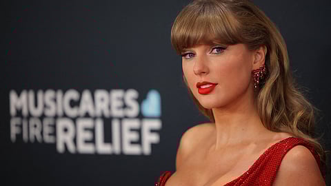 FILE PHOTO: Taylor Swift poses at the red carpet during the 67th Annual Grammy Awards in Los Angeles, California, U.S., February 2, 2025. 