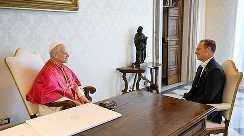 Pope Leo XIV speaks with Brian Francis Burch, the new U.S. ambassador to the Holy See, on the day he received the ambassador's letters of credence, at the Vatican, September 13, 2025.