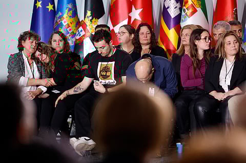 Relatives of victims of the floods in Valencia attend the state funeral marking a year of the disaster, at the City of Arts and Sciences in Valencia, Spain, October 29, 2025. 