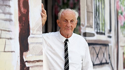 FILE PHOTO: Designer Paul Costelloe poses for a photograph on the day of his catwalk show, during London Fashion Week in London, Britain, September 15, 2023. 
