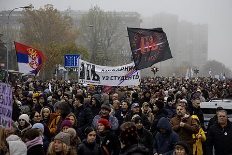 Students and citizens march along a street, marking the first anniversary of the start of their protest movement over of the fatal November 2024 Novi Sad railway station canopy collapse which triggered nationwide accusations of widespread corruption and negligence, in Belgrade, Serbia, November 22, 2025. 