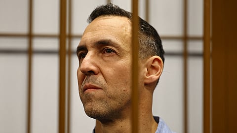 French researcher Laurent Vinatier, who is suspected of illegally collecting sensitive Russian military information, stands inside an enclosure for defendants during a court hearing in Moscow, Russia October 14, 2024.