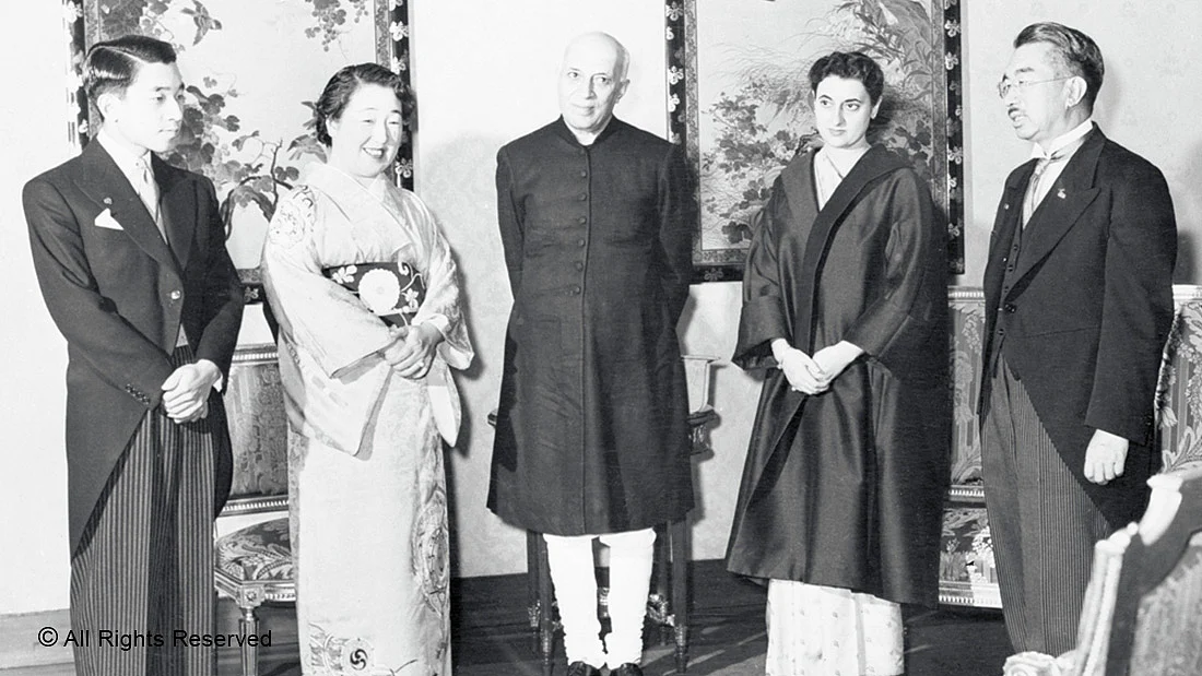 ROYALTY—Prime Minister Jawaharlal Nehru (centre) at the Imperial Palace in Tokyo with his host, Emperor Hirohito (right) in 1957. Also seen are (from left) Crown Prince Akhihito, Empress Nagasako and Indira Gandhi.