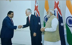 Australian PM Turnbull pilloried for ‘kissing Adanis’ boots’ 