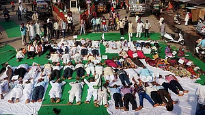 While Modi and Yogi do Yoga, farmers stage ‘corpse pose’ protest
