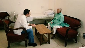 Rahul Gandhi visits Lalu Yadav at his hospital room in AIIMS, Delhi