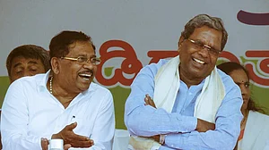 In pictures: Smiling Siddaramaiah, sombre Yeddyurappa on Karnataka campaign