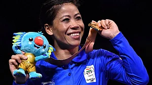 CWG 2018: Mary Kom wins gold; Saina sets date with Sindhu in women’s singles final