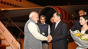 PM Modi, President Xi meet under shadows in Wuhan, China