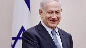 Netanyahu defends Gaza action, Abbas calls for protest
