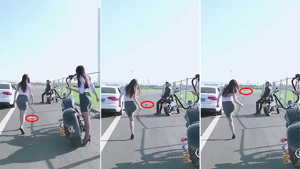 WATCH: Woman free-kicks bottle, Ronaldo-style, back into litterer’s car