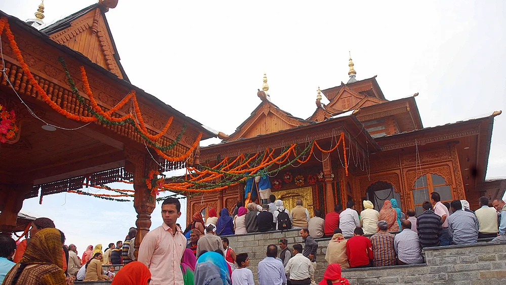 Devotees at the 250-year-old Tara Devi temple, just 13 km from Shimla, which was reconstructed in its original hill architecture with an outlay of over ₹6 crore