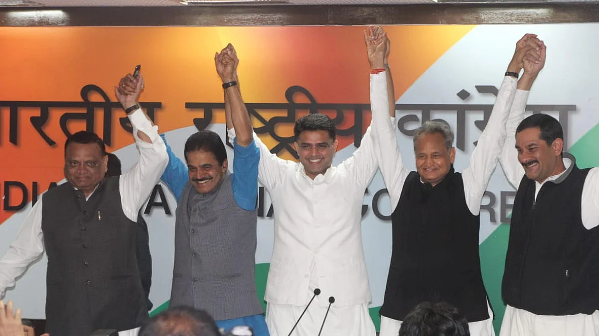 Senior Congress leader KC Venugopal with Sachin Pilot and Ashok Gehlot after the announcement of their names as Rajasthan CM and deputy CM
