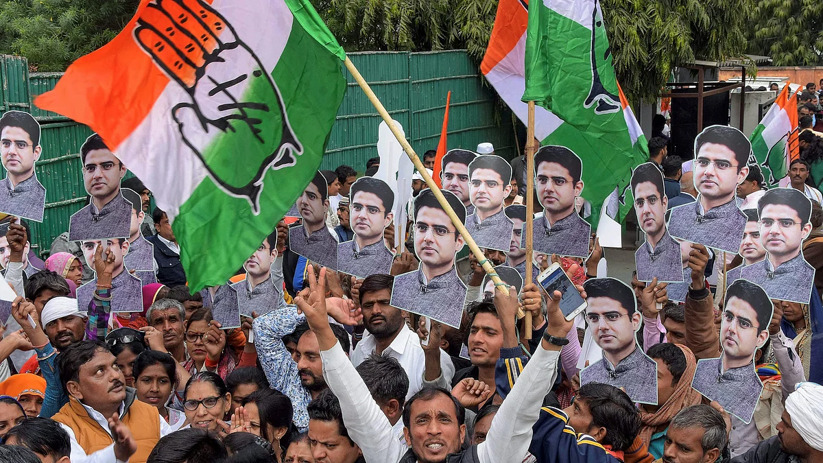 Congress workers and supporters celebrate after the party’s victory in Rajasthan Assembly elections, at party office in Jaipur, Tuesday, December 11, 2018