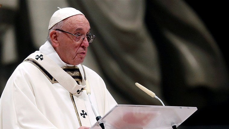 Pope Francis leads the Christmas Eve Mass in Saint Peter’s Basilica at the Vatican