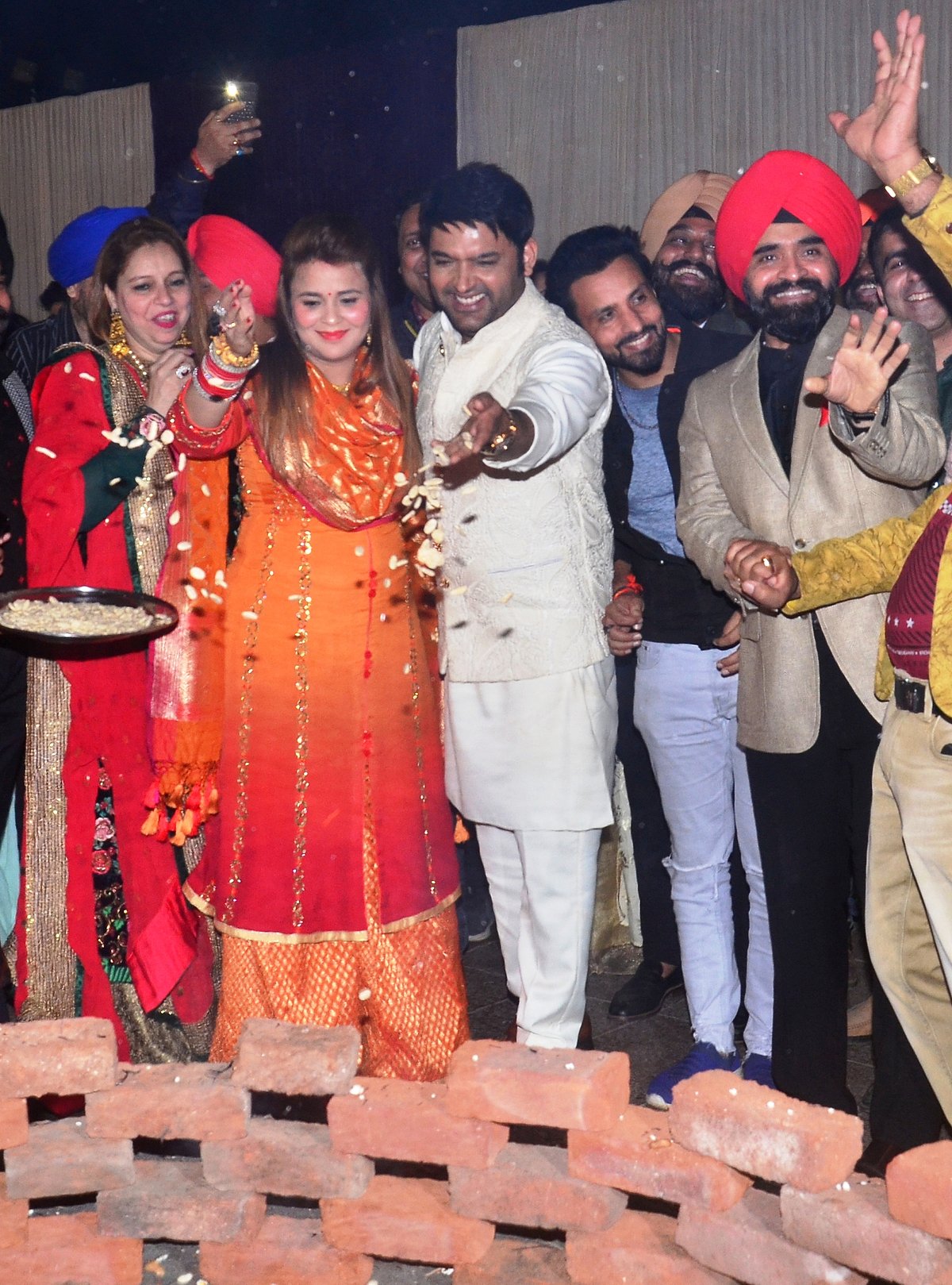 Charan Singh Sapra hosts Lohri party; Kapil Sharma and wife celebrate their first ‘Lohri’ together