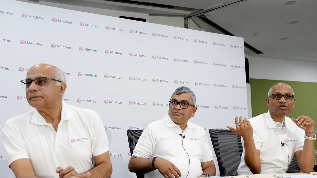 Mindtree Co-founder Subroto Bagchi, Executive Chairman Krishnakumar Natarajan and CEO, MD and Executive Director Rostow Ravanan during a press conference in Bengaluru (Photo: IANS)