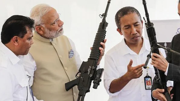 WATCH | BJP billboards glorifying guns, blood and war welcome PM Modi in Gujarat