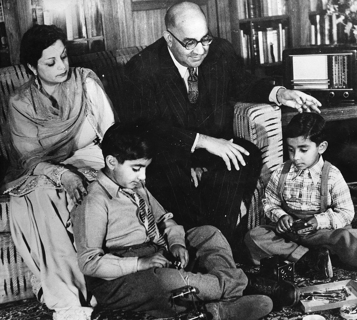  Liaquat Ali Khan (1896 - 1951) at home with his wife Ra’ana Liaquat Ali Khan (1905 - 1990) and their sons, Ashraf (left) and Akbar, in June 1947