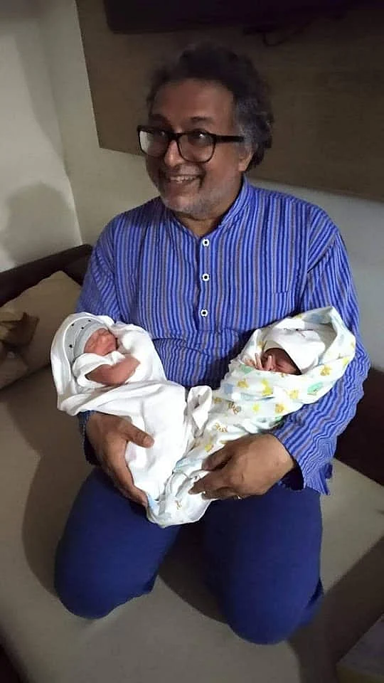 Desmond Coutinho with the newborn twins (Facebook)