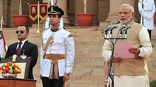 PM Modi taking oath at Rashtrapati Bhavan in 2014.