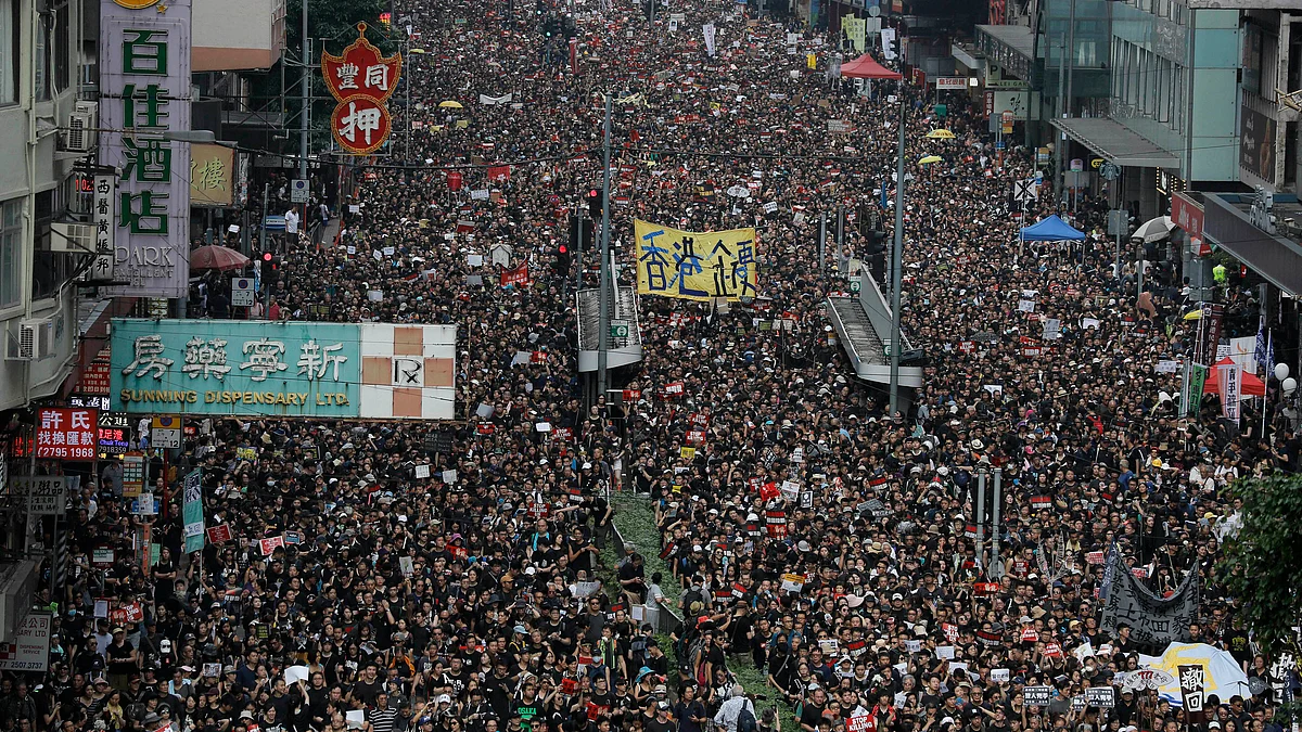 Lakhs of protesters march through the streets of Hong Kong as they continue to protest an extradition bill, on June 16, 2019.