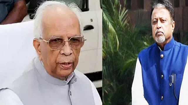 West Bengal Governor KN Tripathi(left) and BJP leader Mukul Roy