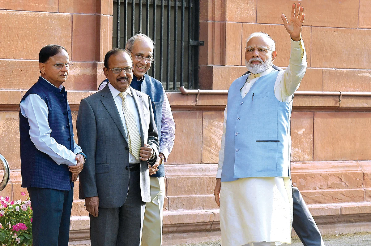 PMO replaces the cabinet, restructuring complete with cabinet rank to Doval, Nripendra Misra and PK Mishra