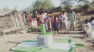 Indian businessman Joginder Singh Salaria installs hand pumps in poverty-stricken Pakistan