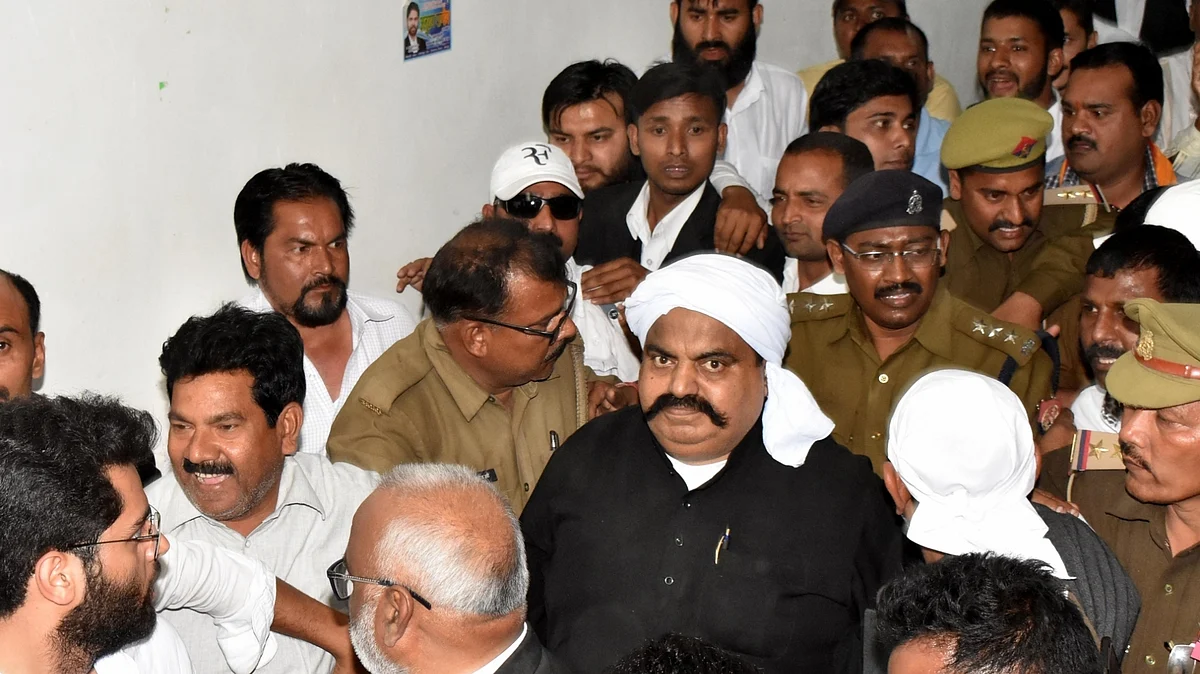 Atiq Ahmed with police escort (photo: IANS)