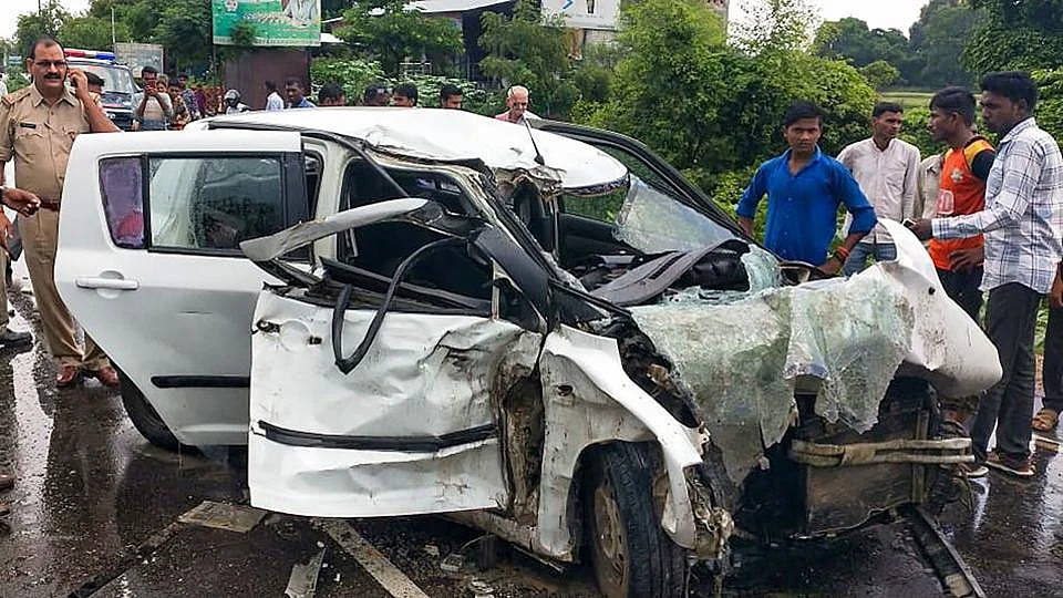 The mangled remains of the car in which the 19-year-old rape survivor was travelling to Rae Bareli with her family.