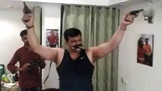 WATCH|  BJP MLA dances to Karan Arjun songs with guns in hand