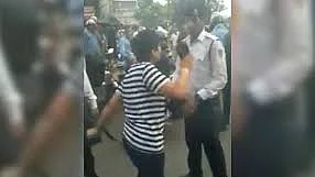 WATCH: Stopped for violating traffic rules, a Delhi woman throws a fit
