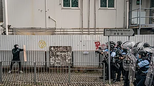 Clashes erupt as protesters try to smash way into Hong Kong Legislative Council on 22nd handover anniversary