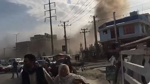Images showed plumes of smoke over Kabul as people ran to safety.