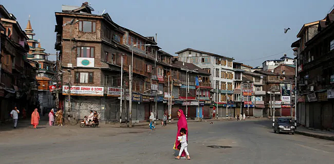 Two hours in queue and two minutes on phone: Of brief conversations, long queues and tears in J&K