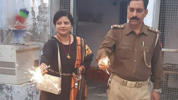 In this old photo, Inspector Subodh Kumar Singh is seen celebrating Diwali with his wife Rajni, who is still waiting for justice.