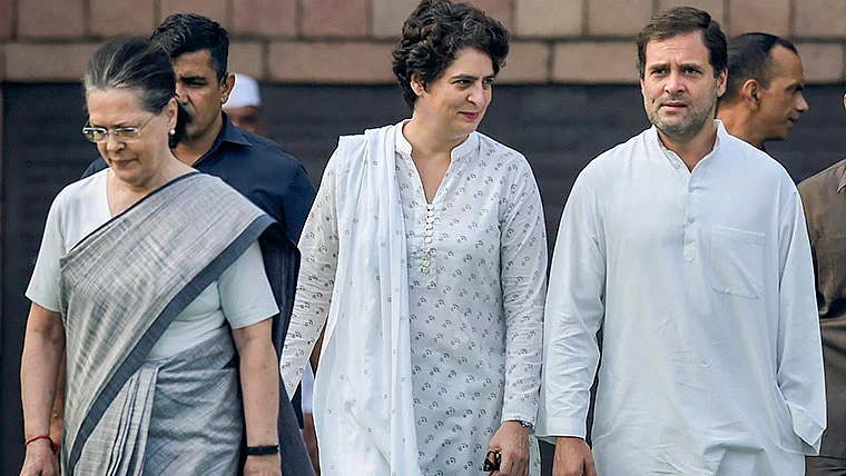 (L-R) Sonia Gandhi, Priyanka Gandhi and Rahul Gandhi