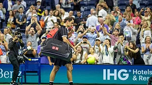 Dimitrov stuns Federer to reach US Open semi-finals