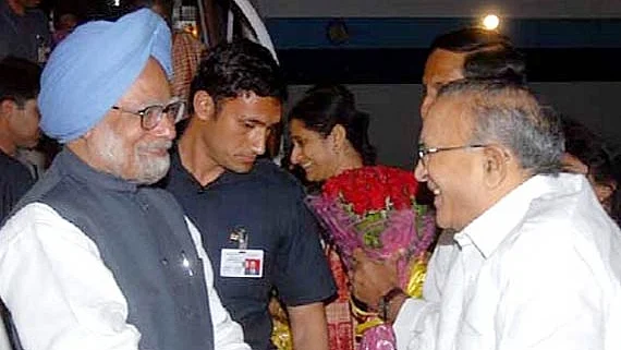 Jaipal Reddy (right) with Manmohan Singh (file photo, PTI).