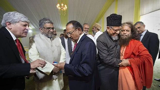 NSA Ajit Doval with Hindu and Muslim leaders during a meet at his residence in the wake of Ayodhya verdict on Nov 10, 2019. (PTI photo)