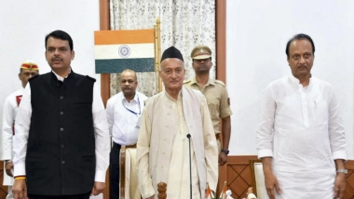 BJP’s Devendra Fadnavis and NCP rebel Ajit Pawar with Governor BS Koshyari after an early morning swearing in on Saturday, Nov 23.